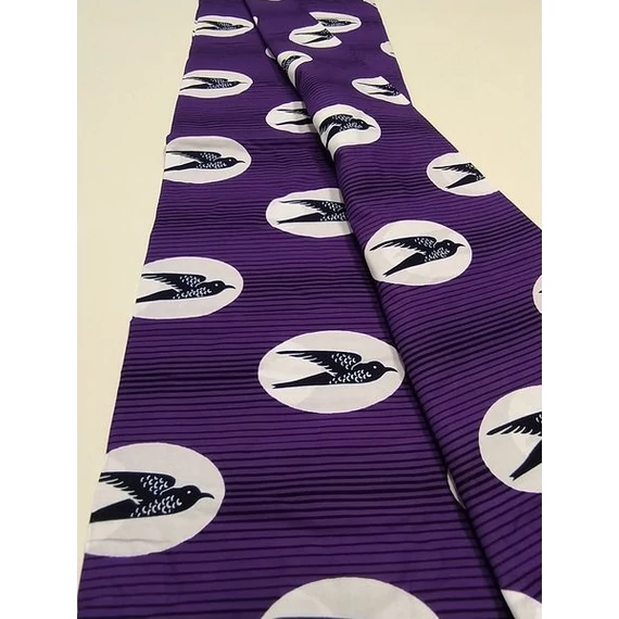 Lila fecskés afrikai textil